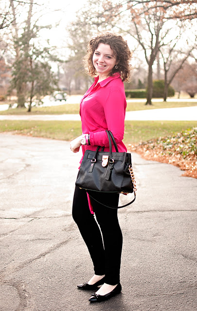 Pink tunic and black pants